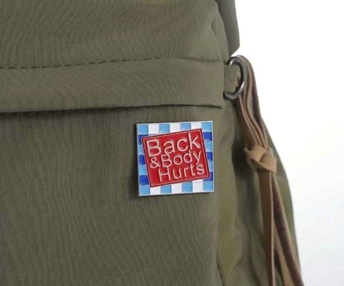 Back and body hurts funny enamel pin